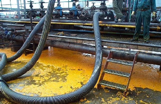 Burst hose, spill of palm oil